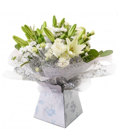 . - Hand tied flowers whites and creams, with selection of foliage to finish.